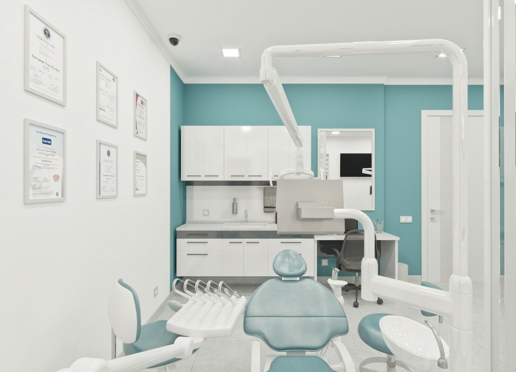 Patient receiving professional teeth whitening treatment at Smile And Skin Co.